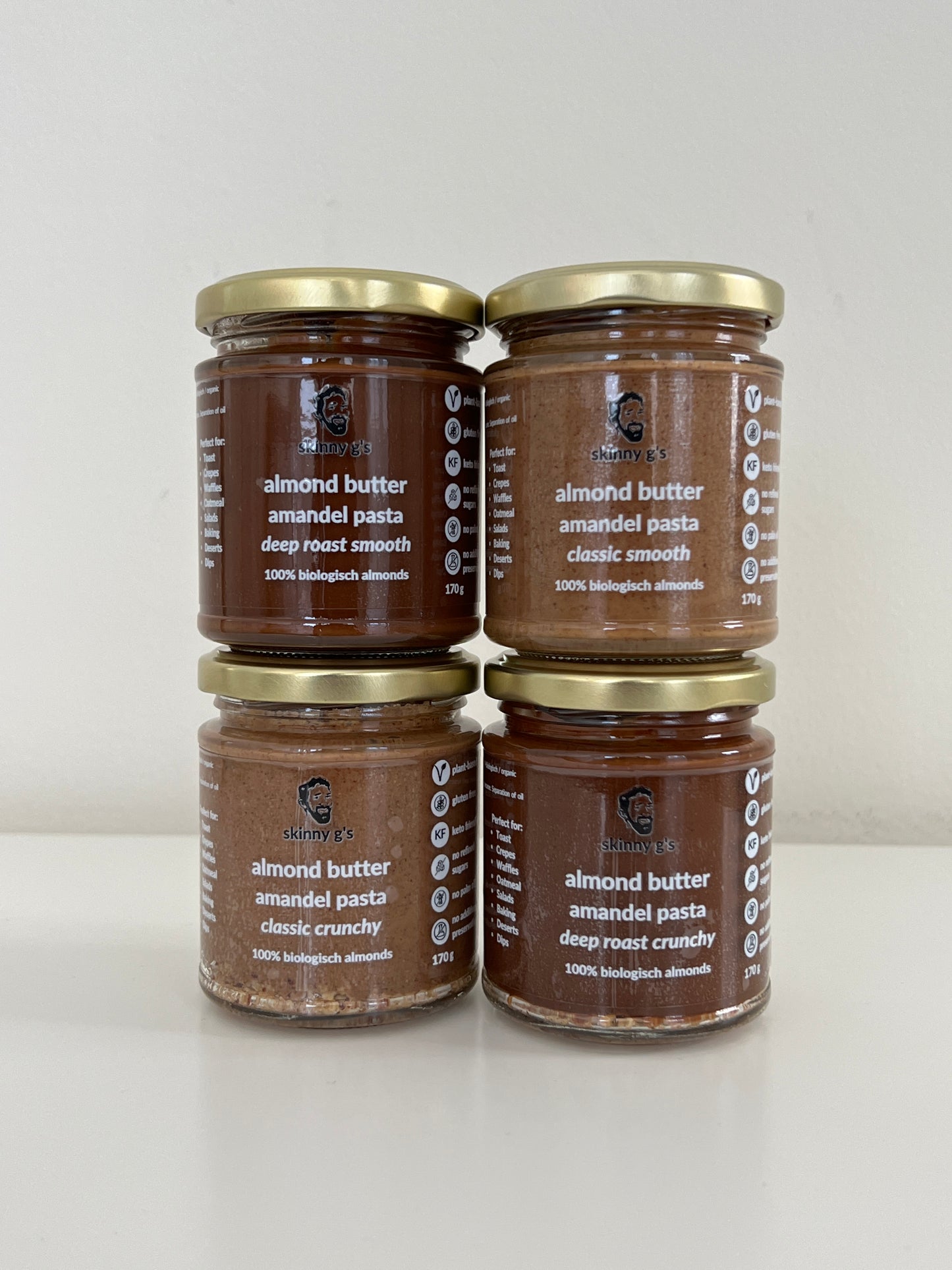 skinny g's almond butter in four flavours - classic smooth, classic crunchy, deep roast smooth and deep roast crunchy